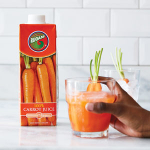 Glass with refreshing 100% Carrot juice and ICE